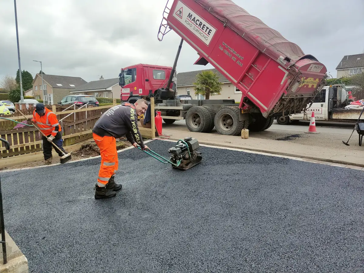 Tarmac driveway being compacted