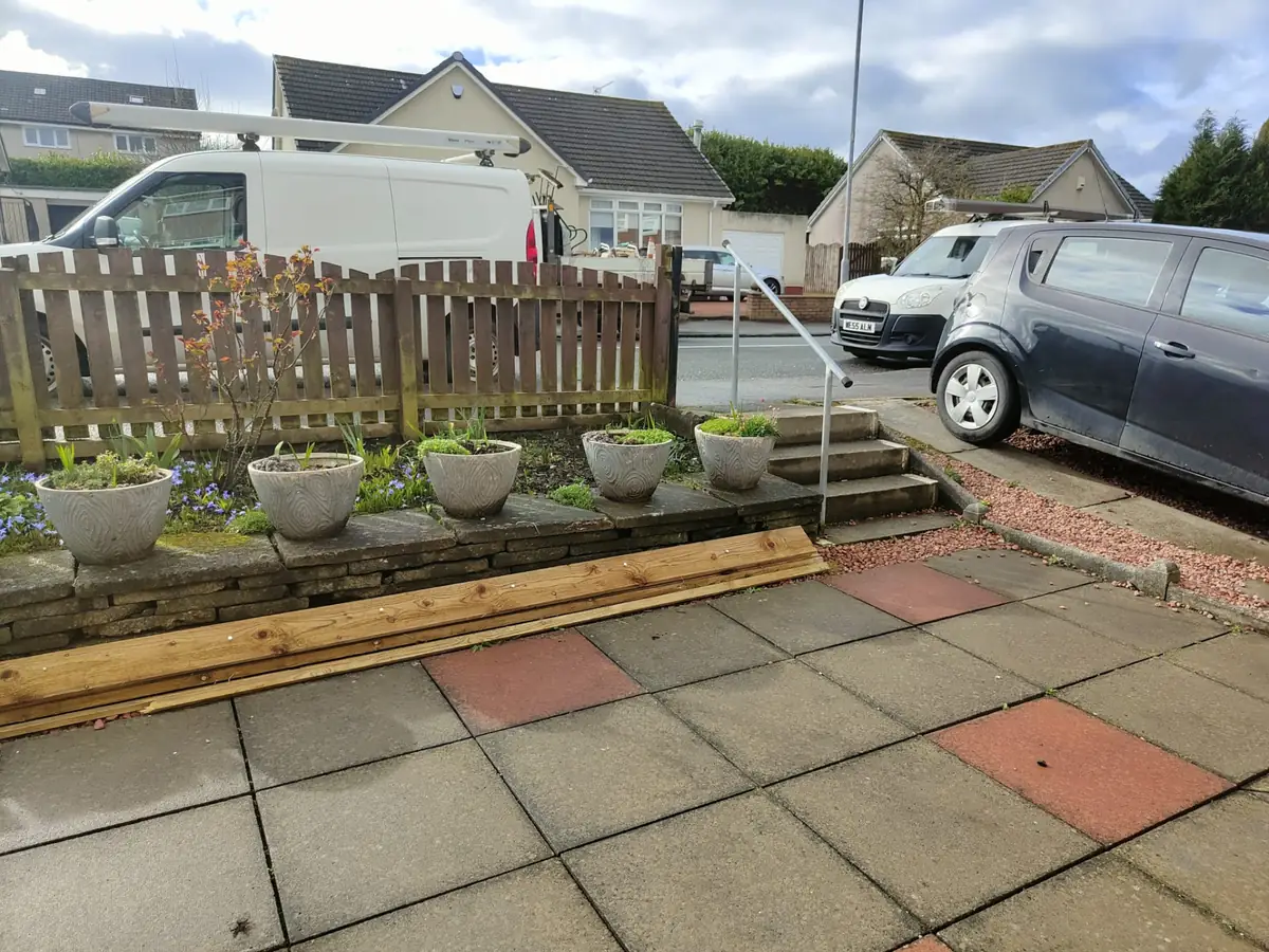 Pothole repair and hot tarmac patch surfacing on a private access road in Scotland